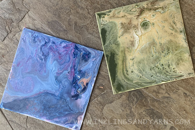 Two paintings made by pouring acrylic paint onto canvas