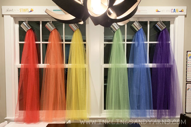 Rainbow curtains made with paint cans and tulle