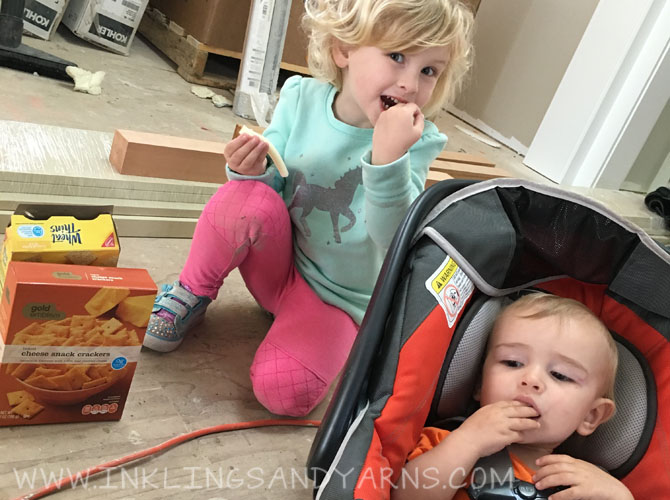 Allie and Theo have a picnic in the new house.